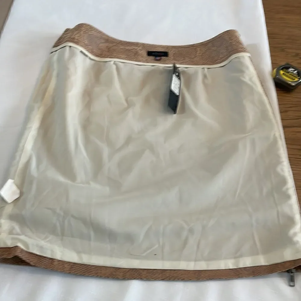 WOMAN BRAND SNAKE PRINT MACHINE WASHABLE MINI SKIRT.  NEW WITH TAGS